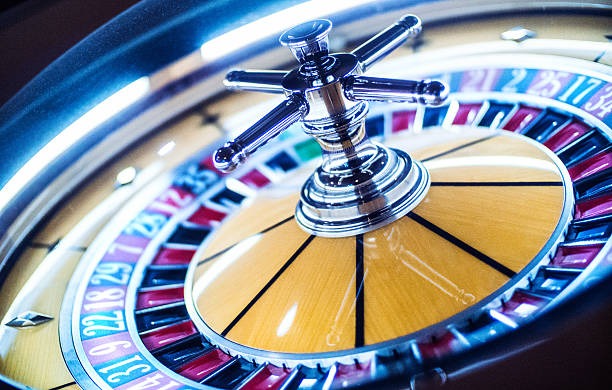 Live-dealer studio broadcast showing card reveals and player interface on riblox platform